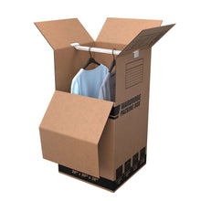 Kraft wardrobe moving box with clothes hanging on bar, box flaps open