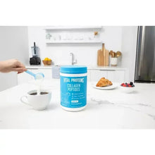 Vital Proteins collagen peptides powder tub with scoop pouring powder into cup