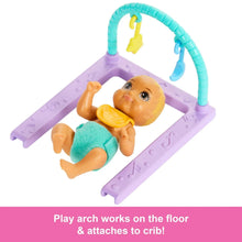 Lavender baby activity arch with blonde baby doll lying down