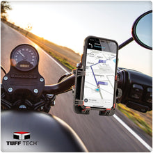 Handlebar phone holder gripping a smartphone with map screen on the mount