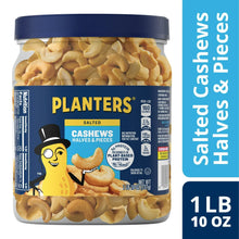 Salted cashew halves and pieces canister, blue-lidded jar with PLANTERS label