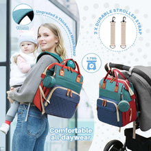Gray baby diaper bag backpack with tan leather-style trims, quilted front, and wide zipper.