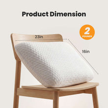 White memory foam pillow, side profile with textured cover; about 23 x 16 in