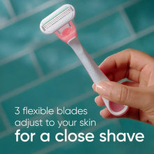 Disposable women's razor with white handle, pink grip, and silver triple blades