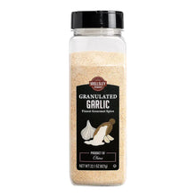 Granulated garlic spice bottle with clear container and black cap, front label