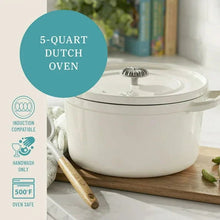 White 5-quart enameled cast iron Dutch oven with lid and side handles