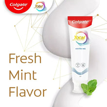 Total Active Prevention whitening toothpaste tube with mint flavor and mint leaves