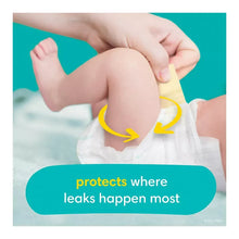 Baby diaper on child’s leg and hand area, with arrows pointing to leak-prone spots.
