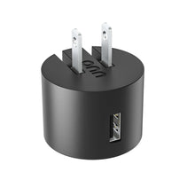 Black single-port USB-A wall charger with foldable plug prongs