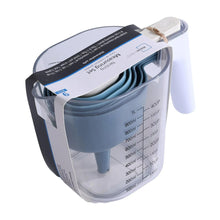 Stackable measuring cup set in clear storage container with blue cups