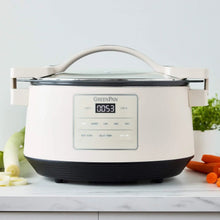 GreenPan 8-quart slow cooker with display panel, cream body and locking lid.