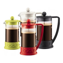 French press coffee makers in lime, red, and black with glass carafes