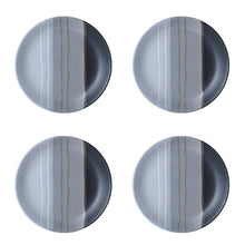 Gray stoneware dinner plates with vertical stripe glaze and dark rim accents