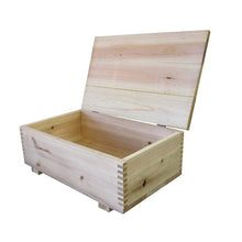 Cedar storage box with hinged lid open, empty interior