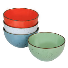 Red and white stoneware bowls with speckled glaze and gold rims, plus a mint bowl