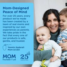 Smiling mother holding a baby, with a blue text panel beside them
