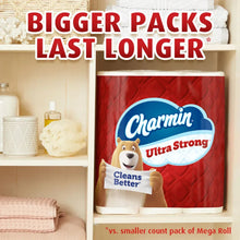 Charmin Ultra Strong toilet paper mega pack pouch on a shelf, white roll visible