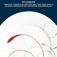 White round glass dinner plate with red and gray swirl design