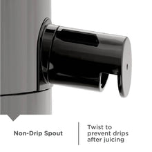 Non-drip spout on black base from a fruit and vegetable juicer