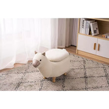 Cream plush llama ottoman with rounded body and short legs, side view.