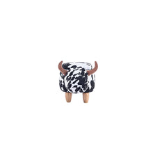 Cow print ottoman with open lid and two wooden legs