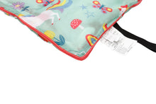 Sleeping bag corner detail with unicorn print, turquoise fabric and red piping