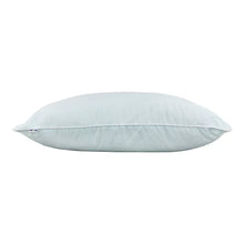 Light blue pillow with stitched edge seam and small corner label