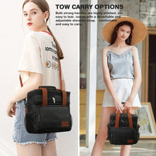 Insulated lunch cooler bag in black with brown trim, adjustable shoulder strap and carry handles.