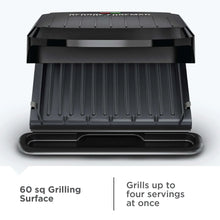 Closed black grill and panini maker with ridged plates and drip tray base