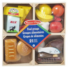 Wooden food groups set in crates with labeled cards and mixed food pieces