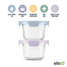 Clear glass food storage container with blue top and purple leak-proof lid