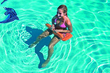 Orange saddle seat float with orange-and-white design, used in clear water