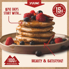 Protein pancakes stack with berries on a plate