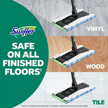 Swiffer mop heavy duty wet cloth pads with blue scrub stripes on floor