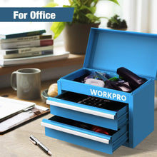Blue mini metal tool box open on a desk with office supplies inside