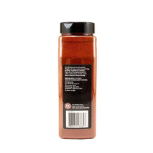 Paprika spice bottle with black cap, product info panel on back.