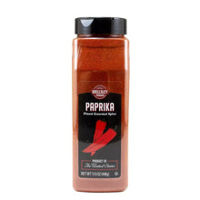 Paprika spice bottle with black cap, Wellsley Farms label on front, 17.5 oz.