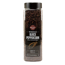 Whole black peppercorns in clear jar with black lid