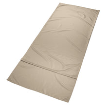Beige sleeping bag liner sheet, folded and laid flat for storage