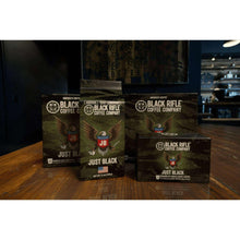 Black Rifle Coffee Company Just Black ground coffee pack on display, medium roast bags