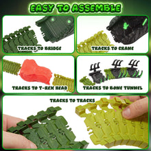 Assorted dinosaur track pieces with connectors and a red LED T-Rex head accessory