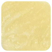 Chest rub balm inside showing pale yellow wax texture