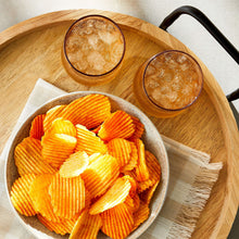Bowl of ripple potato chips with cheddar and sour cream coating
