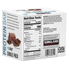 Protein bar box back with nutrition facts panel and chocolate brownie bar pieces