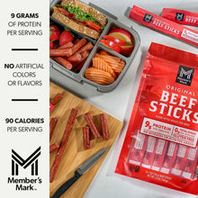 Original beef sticks on a cutting board with food tray, shown beside red package.