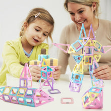 Magnetic building blocks set with pastel tower pieces in blue, pink, and purple