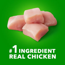 Chicken chunks for puppy dry dog food, pale pink pieces.