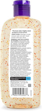 Facial cleanser bottle back view, speckled beige with purple cap, ingredient panel