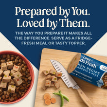 Refrigerated dog food roll beside serving board with meal cubes