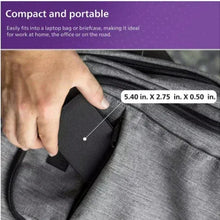 Gray battery pack stored in a zippered laptop bag pocket